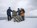 3 cold people at the cairn on Drws Bach - geograph.org.uk - 754543.jpg